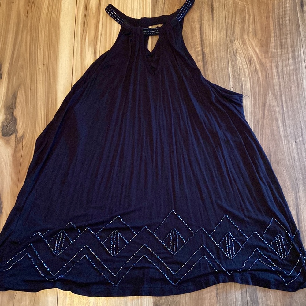 Beautiful hi neck flowing sleeveless blouse